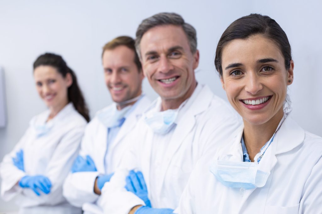 smiling-dentists-standing