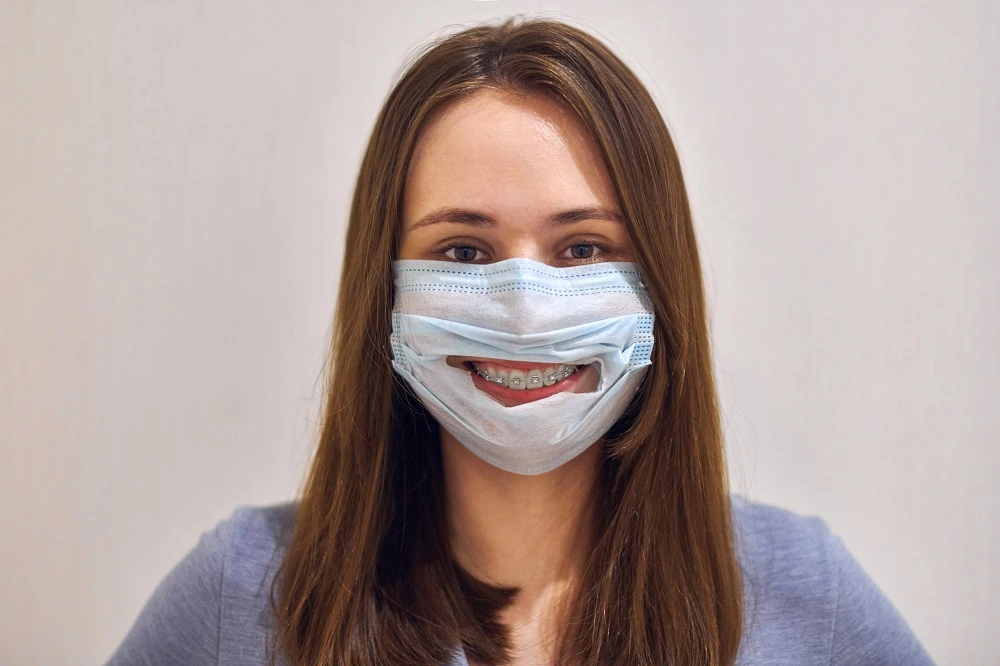 funny-smiling-girl-with-dental-braces