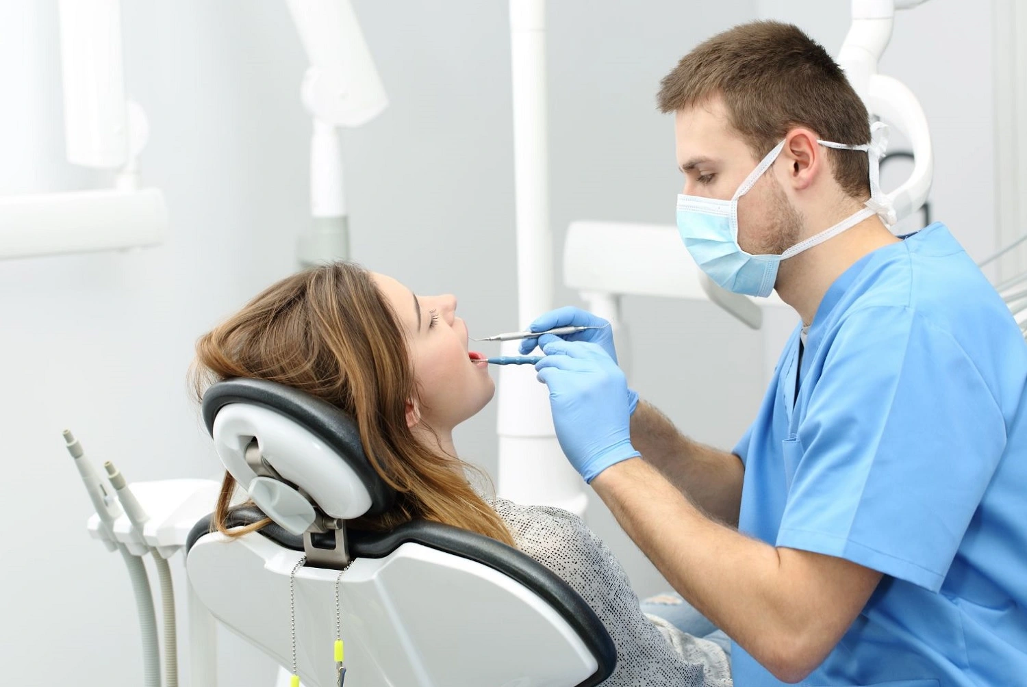 male-dentist-giving-an-oral-exam