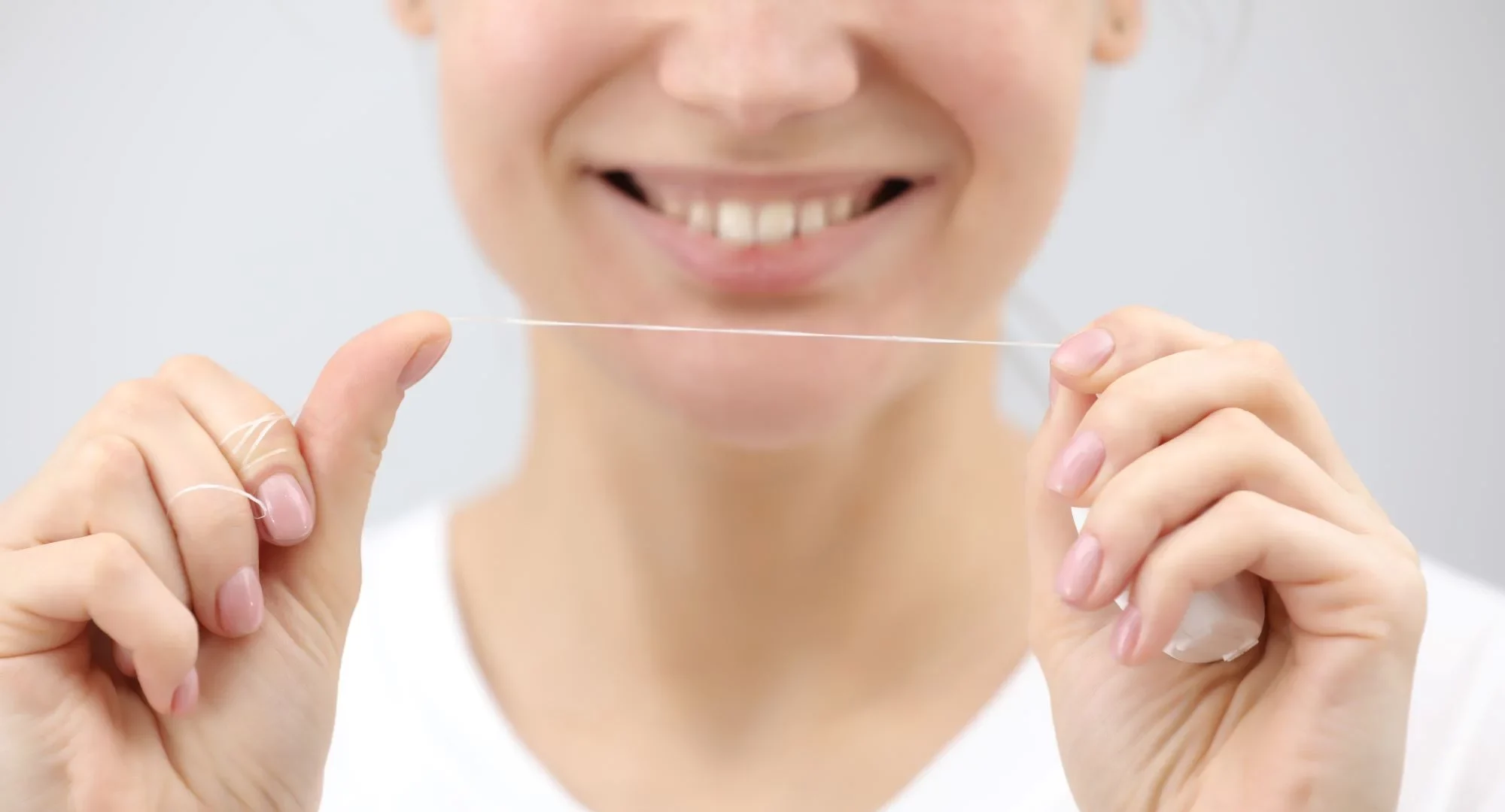 how to floss properly