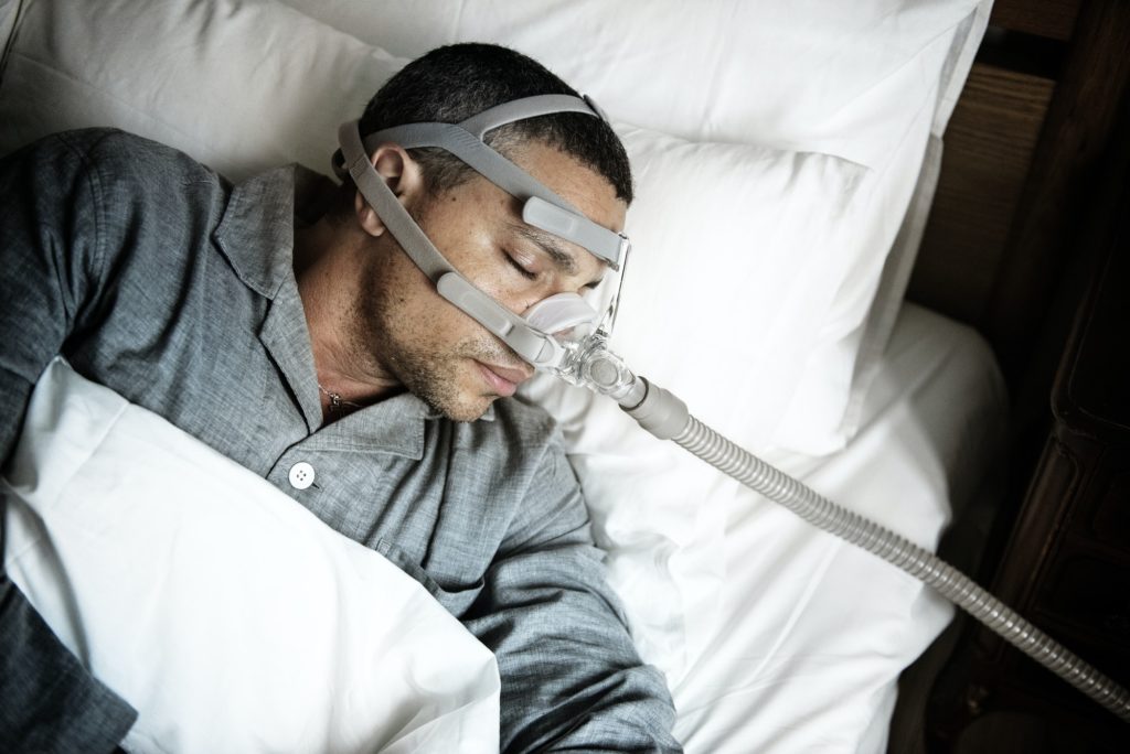 sick man wearing an oxygen mask - Channel Islands Family Dental Office | Dentist In Ventura County