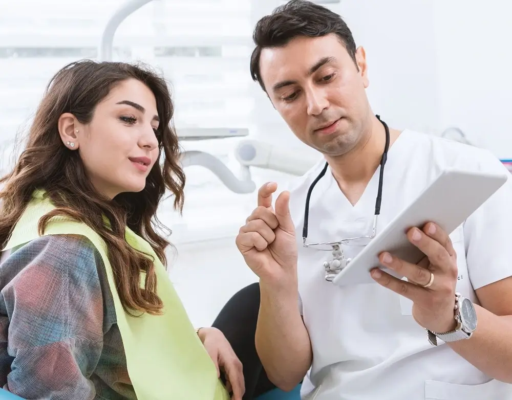 woman-consulting-to-a-dentist