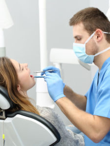 Dentist working with a patient