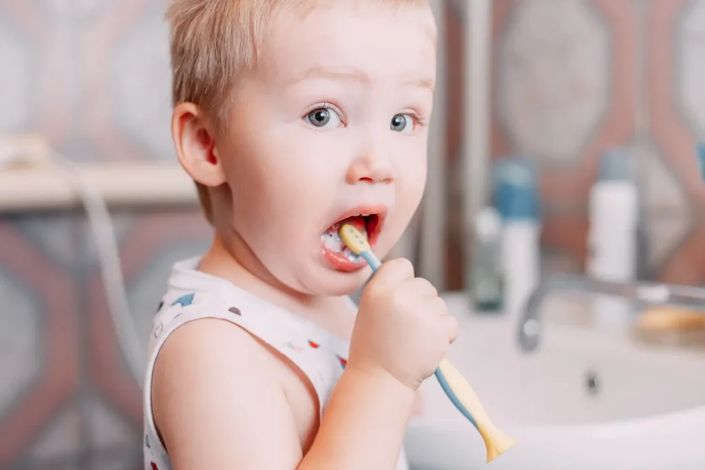 little-child-toddler-boy-brushing-his-teeth-in-bat-2021-09-03-05-57-16-utc-min