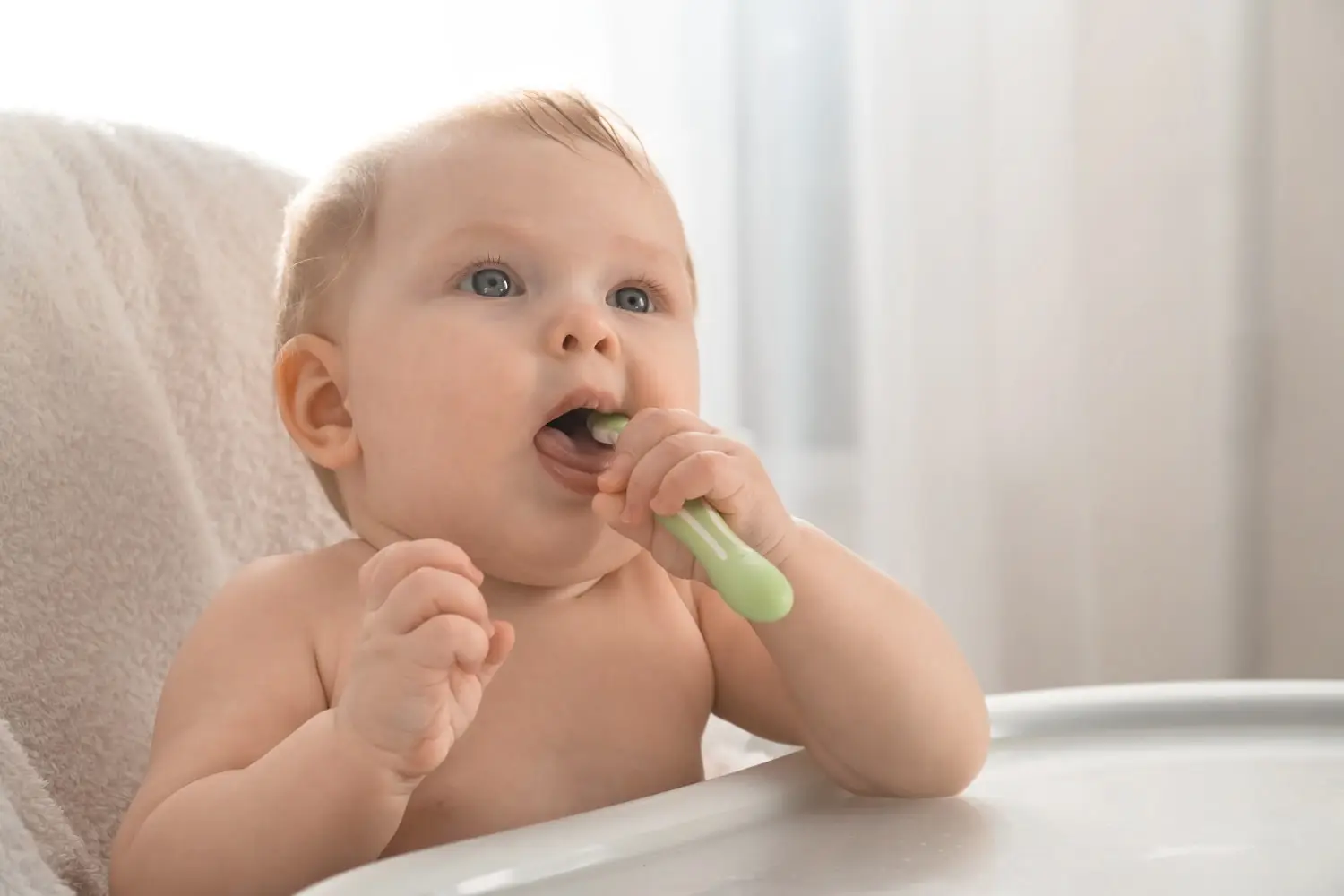cute-infant-baby-clean-teeth