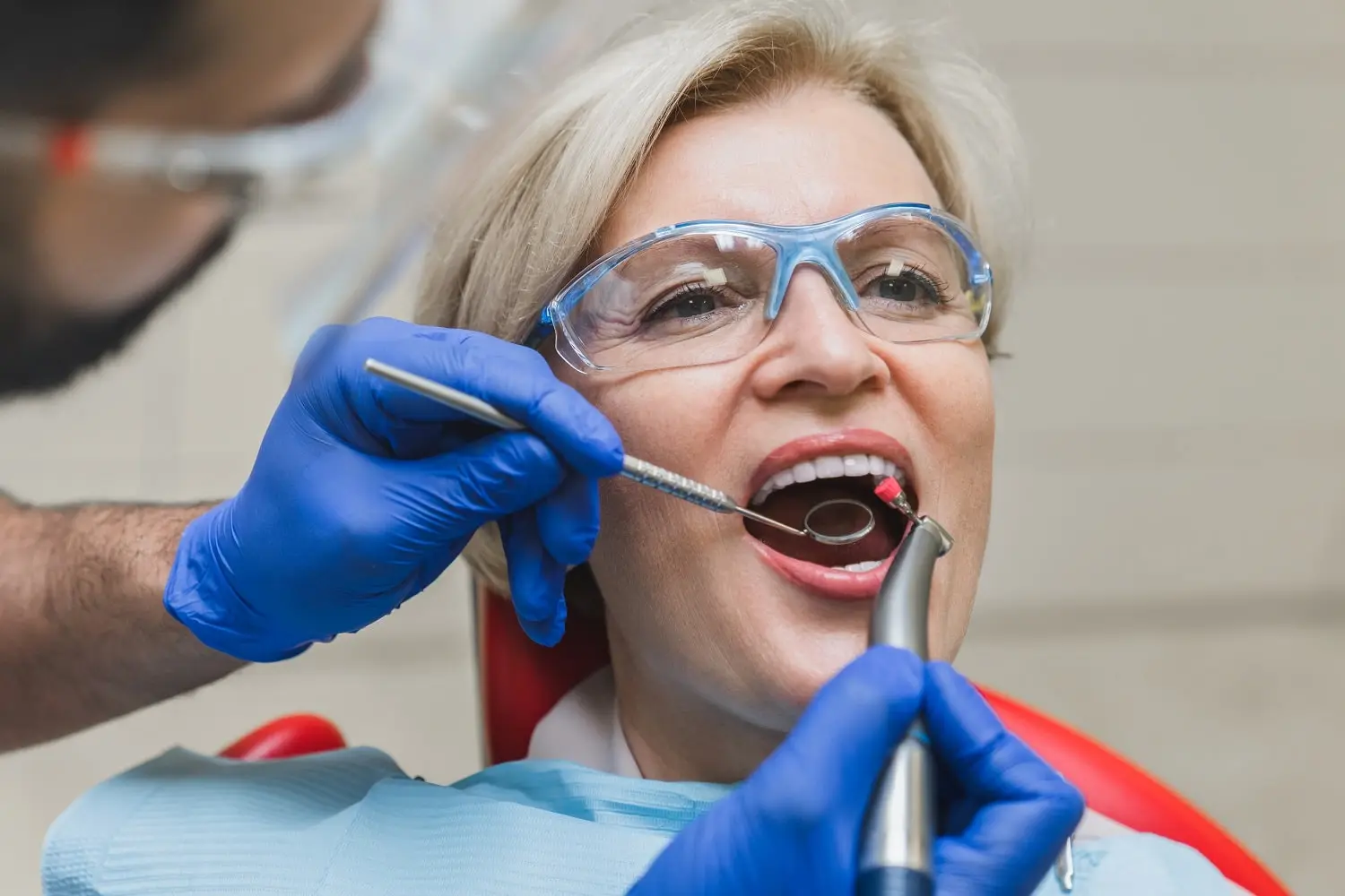 senior-woman-getting-checked-after-getting-toothache-after-a-dental-filling
