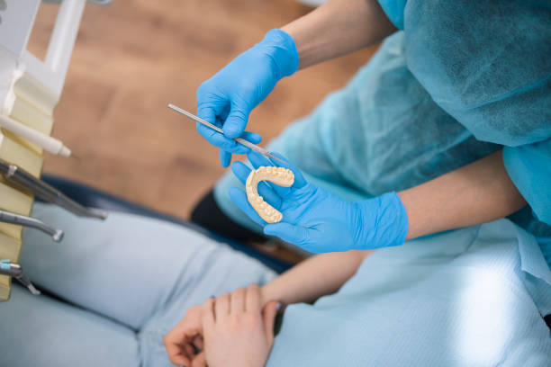 dentist showing denral plasterdentist showing dental plaster