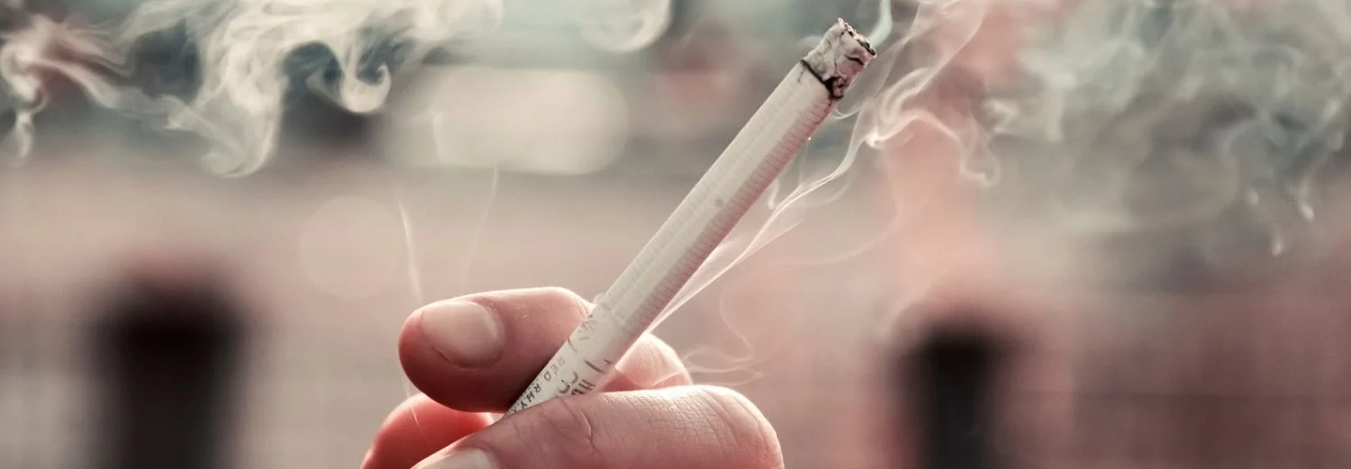 man-with-nicotine-stomatitis-smoking-cigarettes