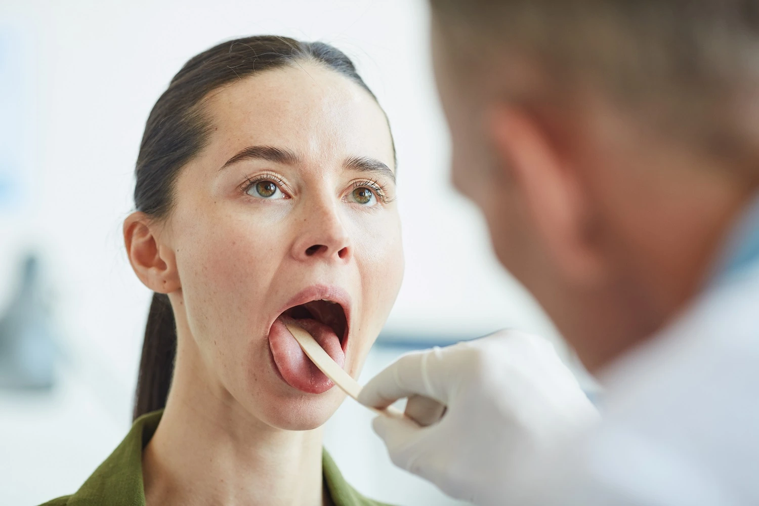 girl-checking-by-dentist