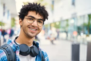 Young man with clear braces