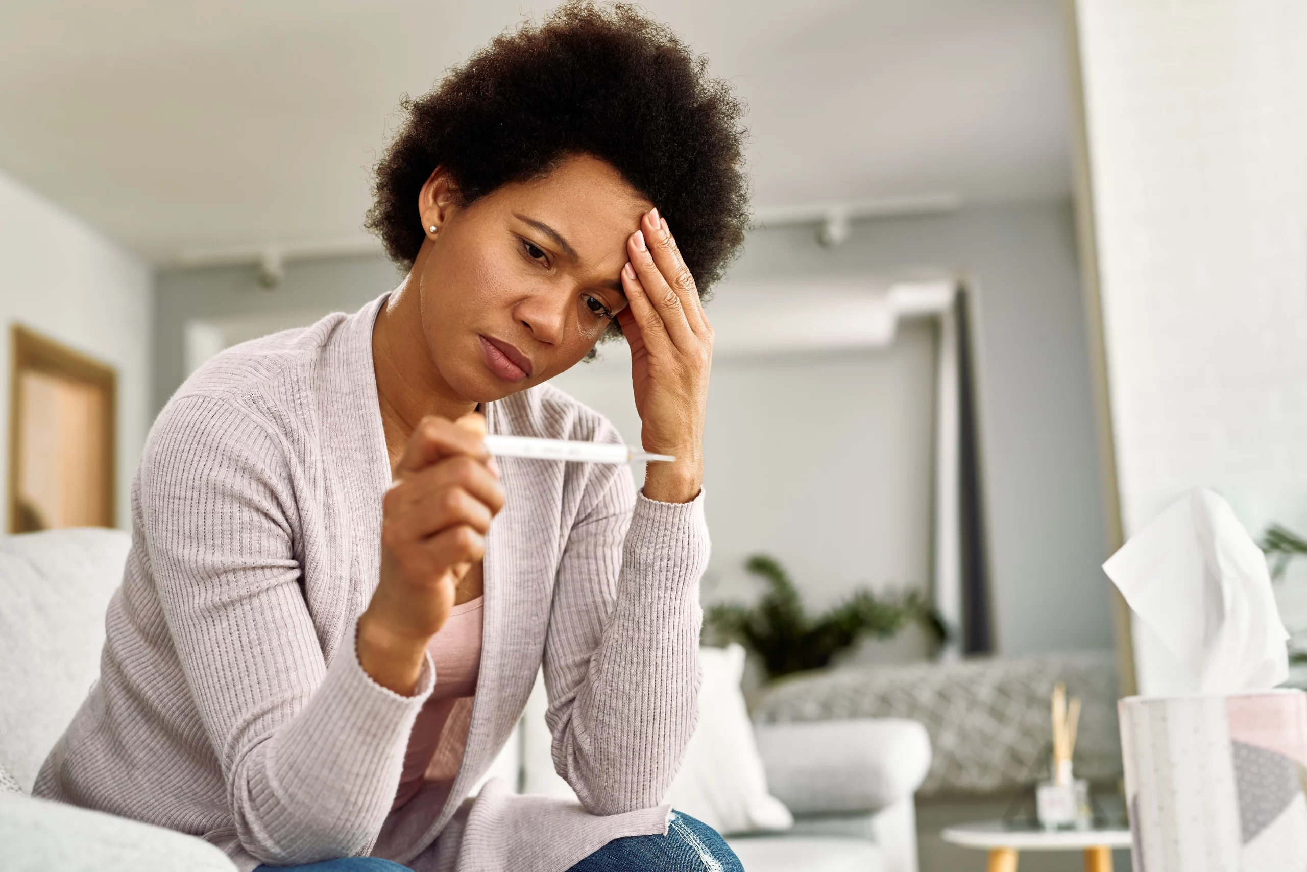 Mujer con fiebre