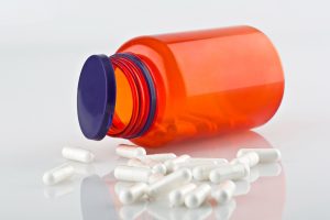 a-orange-pill-bottle-against-a-white-background-2022-05-19-05-17-21-utc