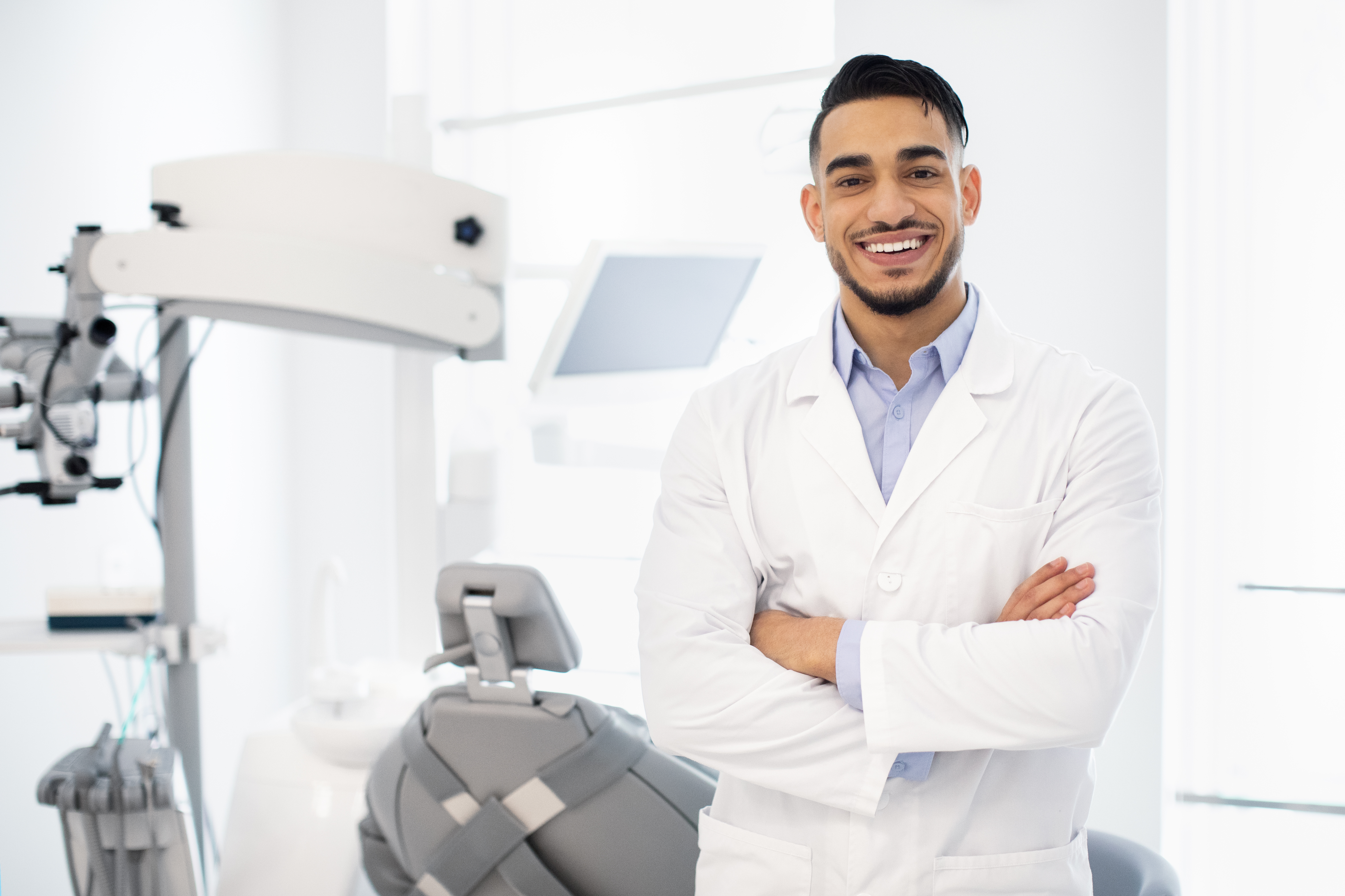 Portrait Of Smiling Dentist Doctor