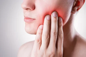 Woman Suffering from Wisdom Tooth Pain