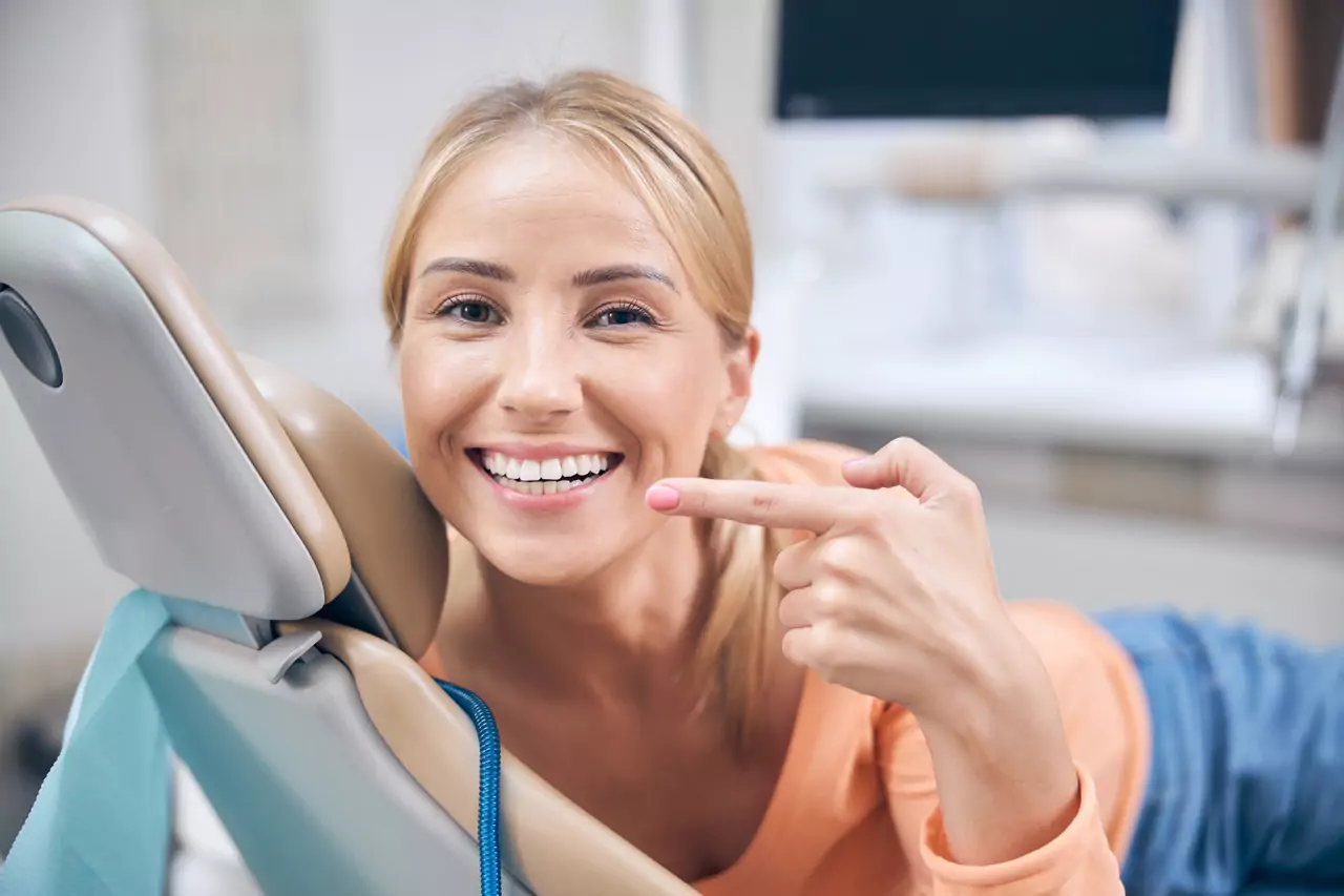 woman demonstrating perfect smile