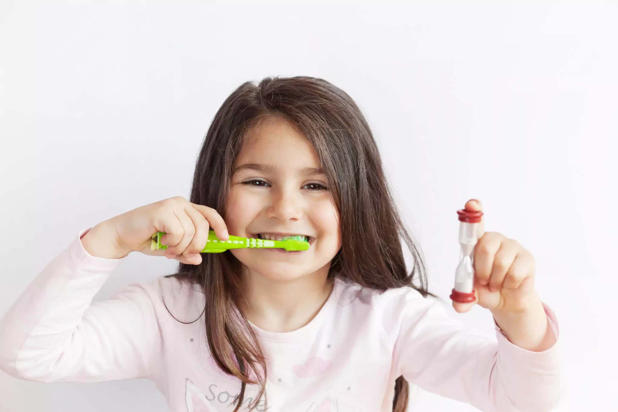 Girl brushing her teeth