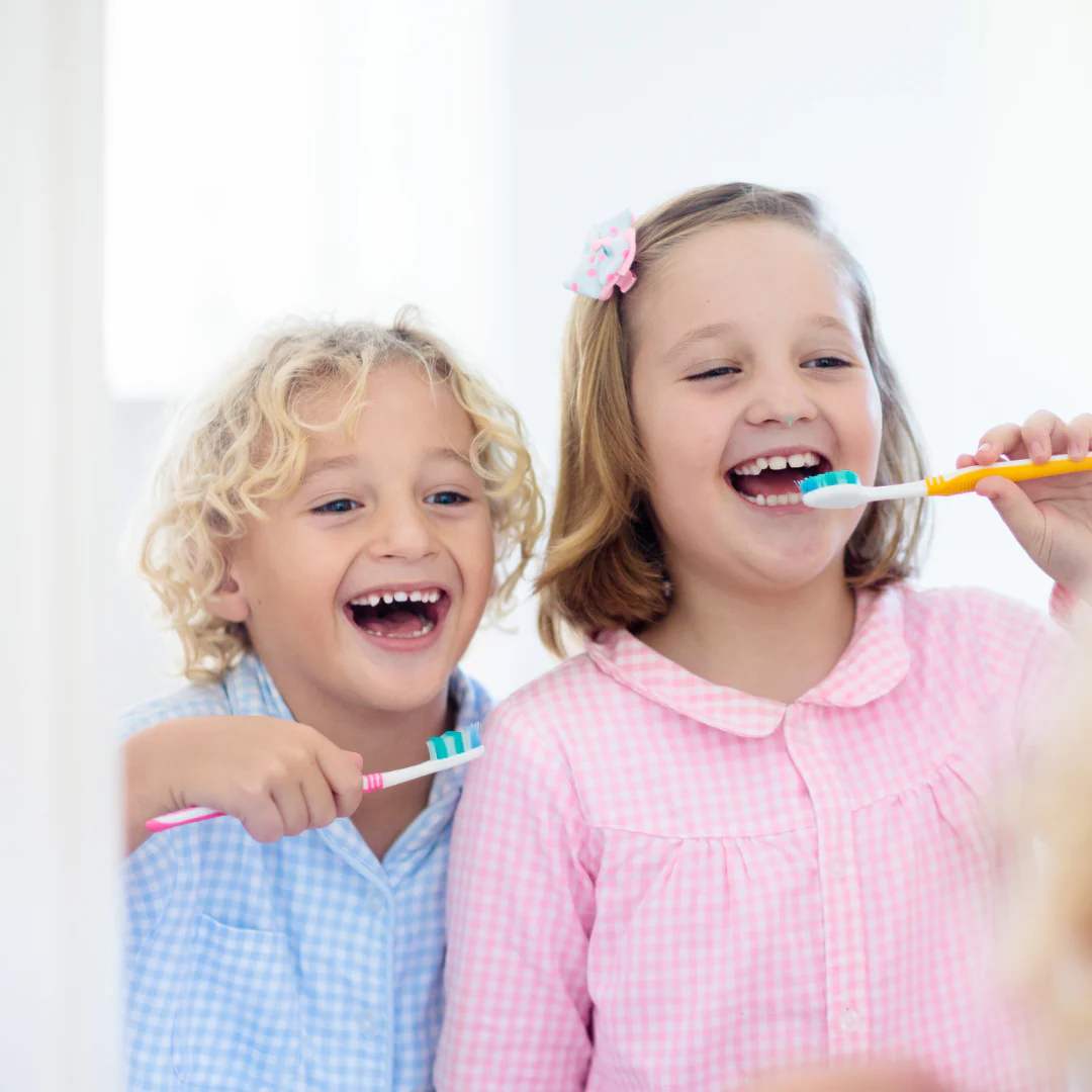 kids brushing their teeth