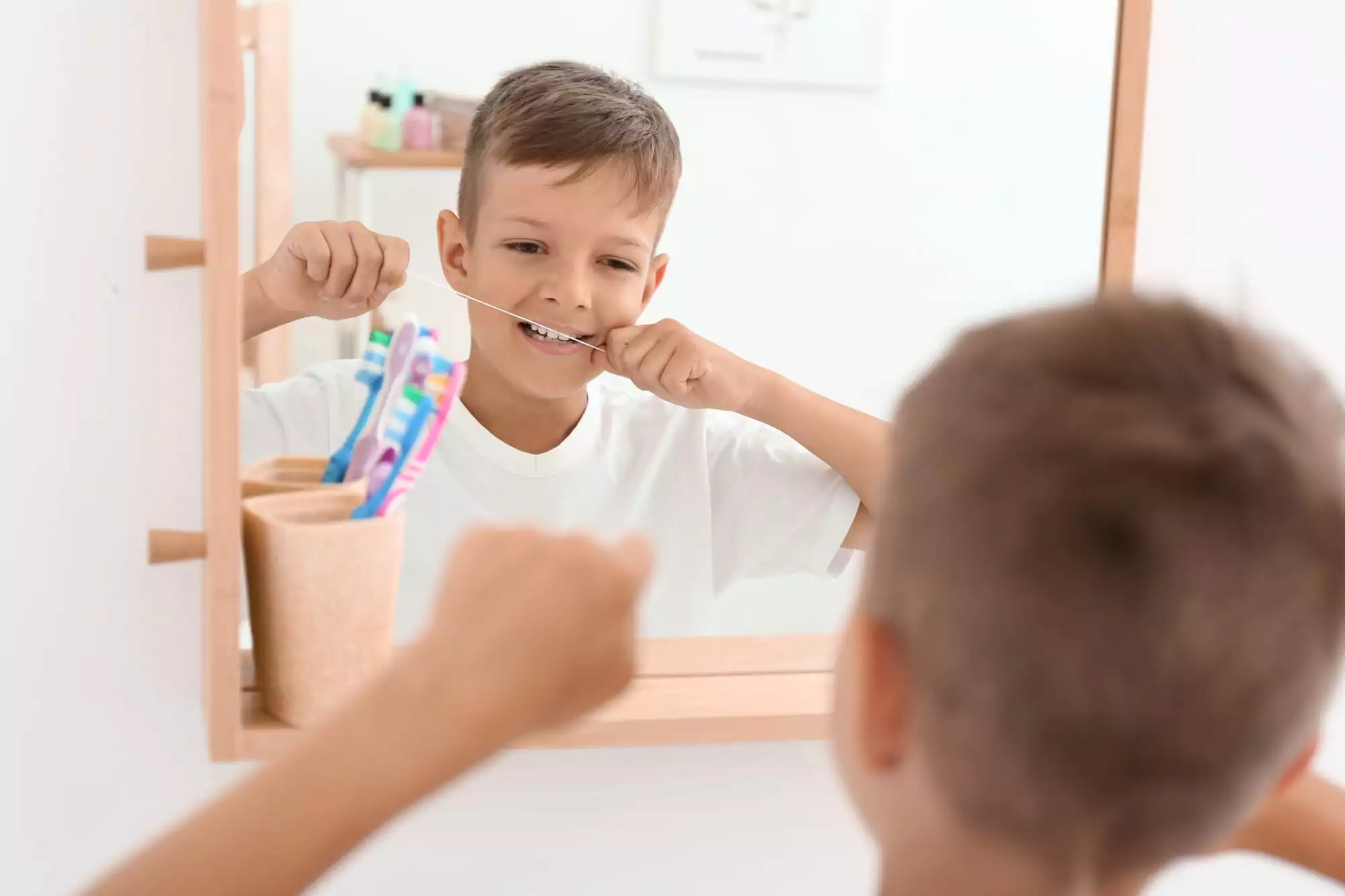 Boy looking at mirror