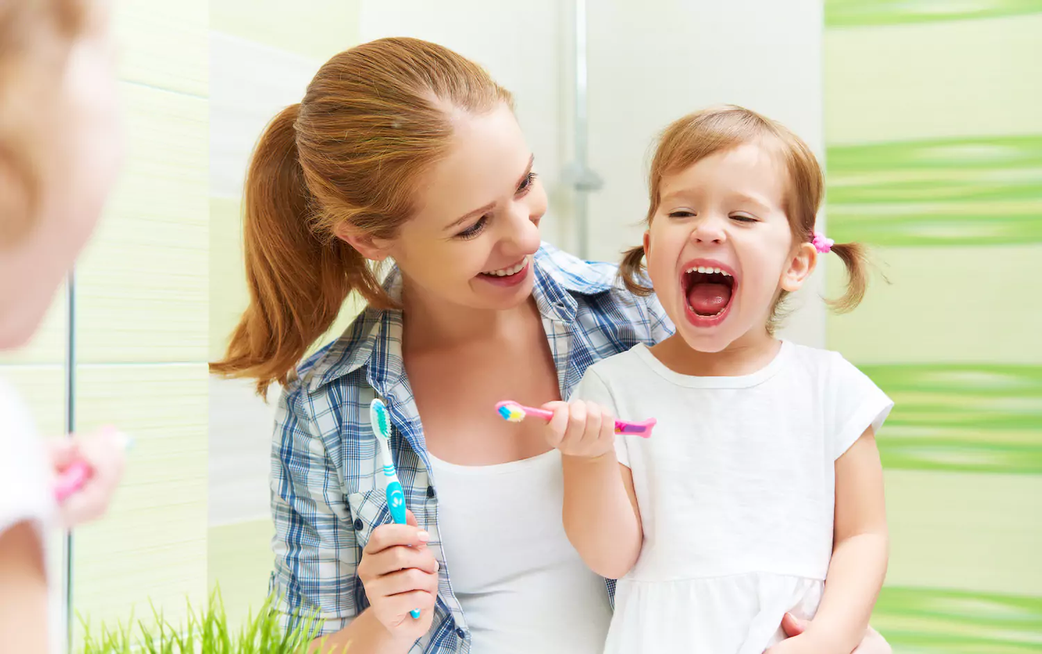 Girl smiling with mother