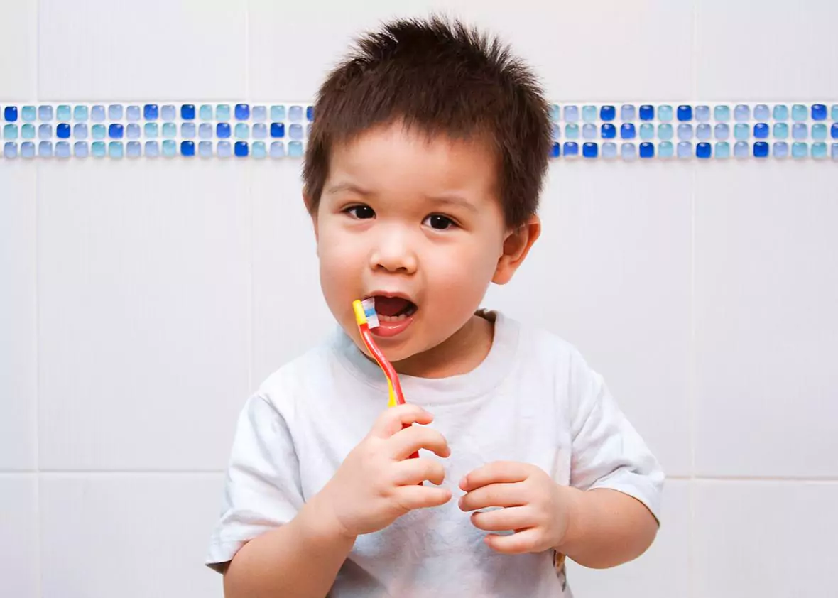 Boy Brushing his teeth