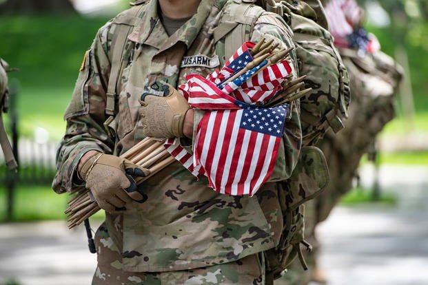 a group of soldiers carrying flags