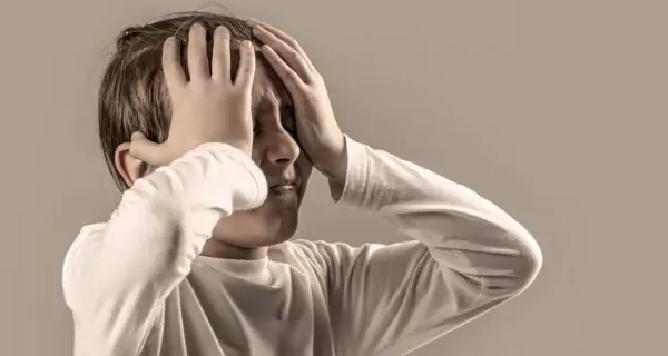 What are the signs that a child is grinding their teeth?