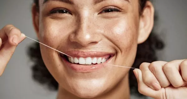 How can women keep a healthy smile for life?