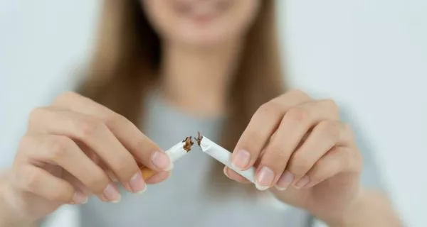 What habits should you avoid for better oral health?