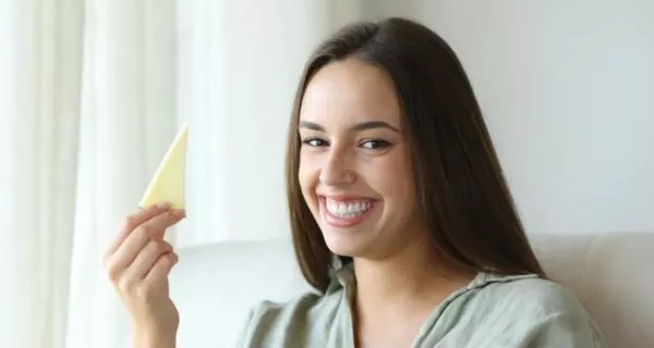 How can I protect my teeth when drinking white wine