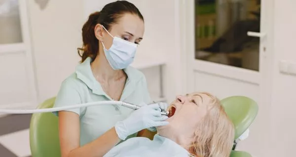 What role do dentists play in preventing systemic diseases?