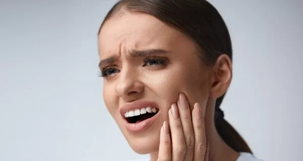 When should you contact your dentist after an extraction?