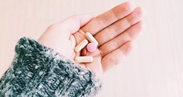 How do cold and flu medications affect teeth and gums?