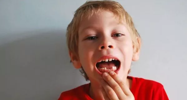 What should be done when a tooth begins to move?