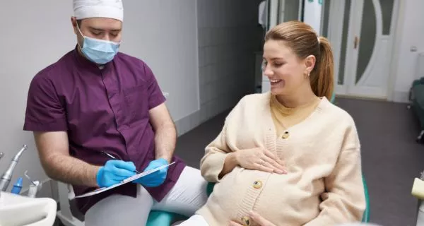 When should you see a dentist during pregnancy?